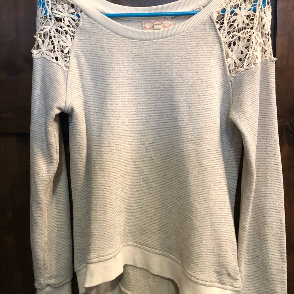 Gray and white striped sweater with lace detailing